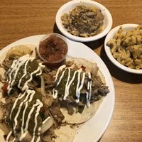 Jackfruit carnitas tacos with sides of tater tot casserole and Mac-n-cheez . at Bean Vegan Cuisine in Charlotte