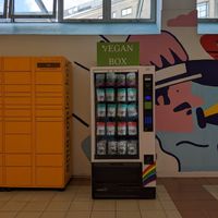 in the hallway out to the buses at Vegan Box Vending Machines in West London