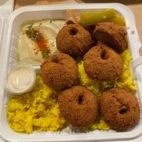 Falafel, turmeric rice, hummus, cabbage salad, and tahini cup at Falafel Kitchen - Food Stall in Dublin