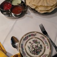 Papadums, the chutney and onion dips are vegan at Bengal Village in East London
