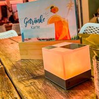 The service cube at Henry’s Sandbar is a game-changer—press it when you need service, and no awkward waiting or interruptions when you don’t. at Henry's Sandbar & Restaurant in Kerpen