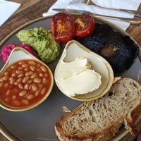 Vegan breakfast with so much butter for one slice of toast, such a waste of food. at The Market Place in Morpeth