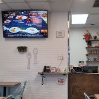 It's small and quaint, but it's a wonderful place. They also serve alcohol for those who are looking for that, as the picture shows. The lady is Angela! at Blue Table Thai Cuisine in Bakersfield