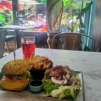 Vegan burger with fries at Le Jardin Suspendu in Metz