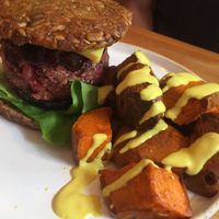 AMAZING raw burger and bun with sweet potatoes cubes  at Wild Food Cafe in London