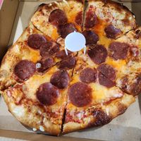 Pepperoni pizza with grass fed pepperoni at Squatcho's in Rochester