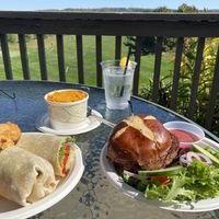 Outdoor dining overlooking golf course- impossible burger, vegan chili, and hummus wrap  at 1741 Pub & Grill in Middlefield