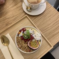 Mango smoothie bowl with flat white (oat milk)   at Soul in the Bowl in Wroclaw