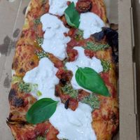 Vegan pesto pizza at Pizzeria Piccola in Ljubljana