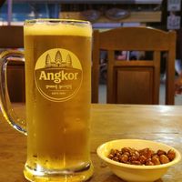 Angkor beer (draft!) Comes with hot nuts. at Taste For Life in Siem Reap