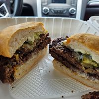 Impossible Smush Burger: two Impossible patties, fried onion, pickle, tofu crema.  at Lua Brewing in Des Moines