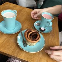 Lattes and cinnamon roll  at Prosper in Ely