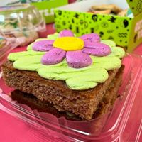 Neon Daisy Pineapple Banana Spice Cake  at Cosmic Bakery  in Upland