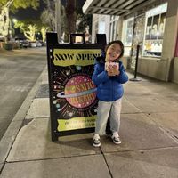 Outside sign   at Cosmic Bakery  in Upland
