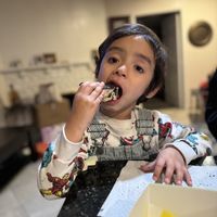 Enjoying the treats   at Cosmic Bakery  in Upland