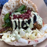 Grüne Sauce Falafel Sandwich with Aubergine  at Rashcook Falafel in Frankfurt