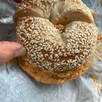Sesame bagel with roasted pepper hummus  at Nubeigel in Cleveland Heights
