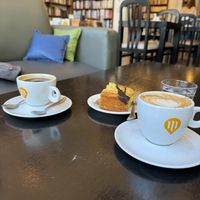 Coffee and cake in this beautiful bookstore!  at Librería Puro Verso in Montevideo