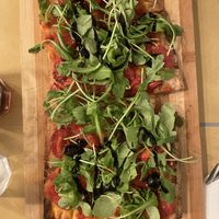 Pomodori confit, rucola, olive, aceto balsamico  at Nonna Cleme in Turin