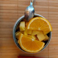 Salade de fruit, peut être servie avec un filet de rhum arrangé maison at Kossaïdi Montparnasse in Paris