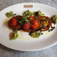 Sweetcorn Fritters & Smashed Avocado (ve)
Harissa & maple dressing, confit tomatoes, spring onion. at Browns in Wilmslow