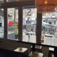 Looking out  at SOIL Vegan Café - East in Amsterdam
