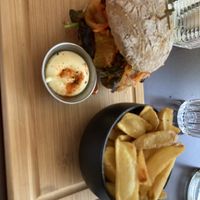 Kimchi tempeh burger and fries  at SOIL Vegan Café - East in Amsterdam