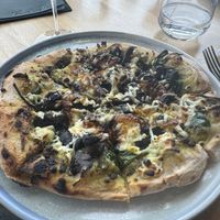 Mushroom Pizza with caramelised onion and vegan cheese - extremely tasty, haven’t had such a nice pizza in a while.   at The Beach House in Blackmans Bay