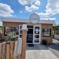 Small and cosy building. It has indoor and outdoor seating. at Zilvermeeuw in Zandvoort