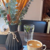 Coffee & water with a sprig of mint at Hidmona in Copenhagen