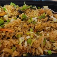 Vegan curry fried rice with vegetables is amazing !!! at Peter and Chia's House in Saginaw