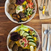Falafel Sabich and Falafel Hummus bowls at Csicseri Gozsdu in Budapest