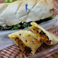 Seiten sandwich and empanada at La Vegana in Buenos Aires
