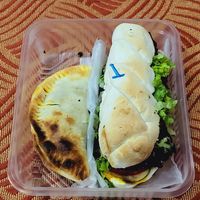 Seiten sandwich and empanada at La Vegana in Buenos Aires