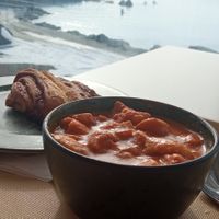 Soup (I put my bread in it as "crouton") and cinamon bun with a view at Kaffi Kvika in Myvatn