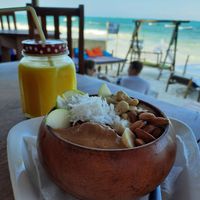 Almond coconut bowl & papaya smoothie at Hello Capitano Zanzibar in Zanzibar