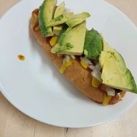Hot dog with avocado at Burger Mel - La Marina in Tenerife