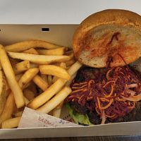 Beet burger with lousy fries. Get sweet potato instead. at Gordon Ramsay Food Market in Cherokee