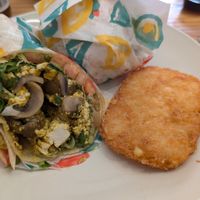 Breakfast burrito with tofu scramble, mushrooms, and hash brown at Vegan Grill - Upper East Side in New York City