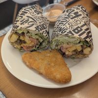 Breakfast burrito with just egg and sausage and chipotle mayo on the side +hash brown! at Vegan Grill - Upper East Side in New York City