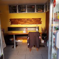 Minimal indoor seating at Speedy Kebab Pizza Imbiss in Arbon