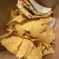 El vegano box (second taco and guacamole are underneath chips)  at Barrio Tacos in Salem