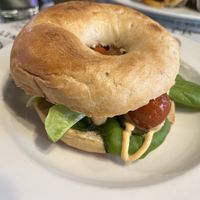 The boss bagel with tofu, salad, tomatoes and a spicy dressing   at La Desayunería  in Malaga