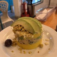 Pressed potato with olive, avocado, scrambled tofu, creole  at Asianica Street Food - temporarily closed in Lima