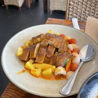 Panang curry with duck  at Oops Modern Thai Restaurant in Sydney