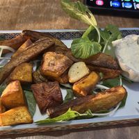 Potato wedges with garlic sauce   at The Fringe in Battambang