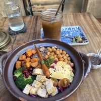 Buddha bowl and iced coffee with coconut milk at The Fringe in Battambang
