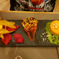 Vegetable chips, filled tomato and carrot and cheese patty. at il Giardino - Palatini Terme in Salzano