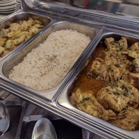 Tasty potatoes and rice, plus meat and fish dish (part of €11.45 buffet, which includes drink and coffee) at Cinco Cozinha Portuguesa e Vegetariana in Lisbon