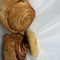 orange roll, cinnamon rolls, and cornbreadd  at Panaderia Taita in Cuenca